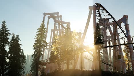 old-roller-coaster-at-sunset-in-forest